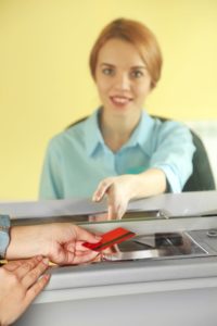 Bank teller and customer transaction